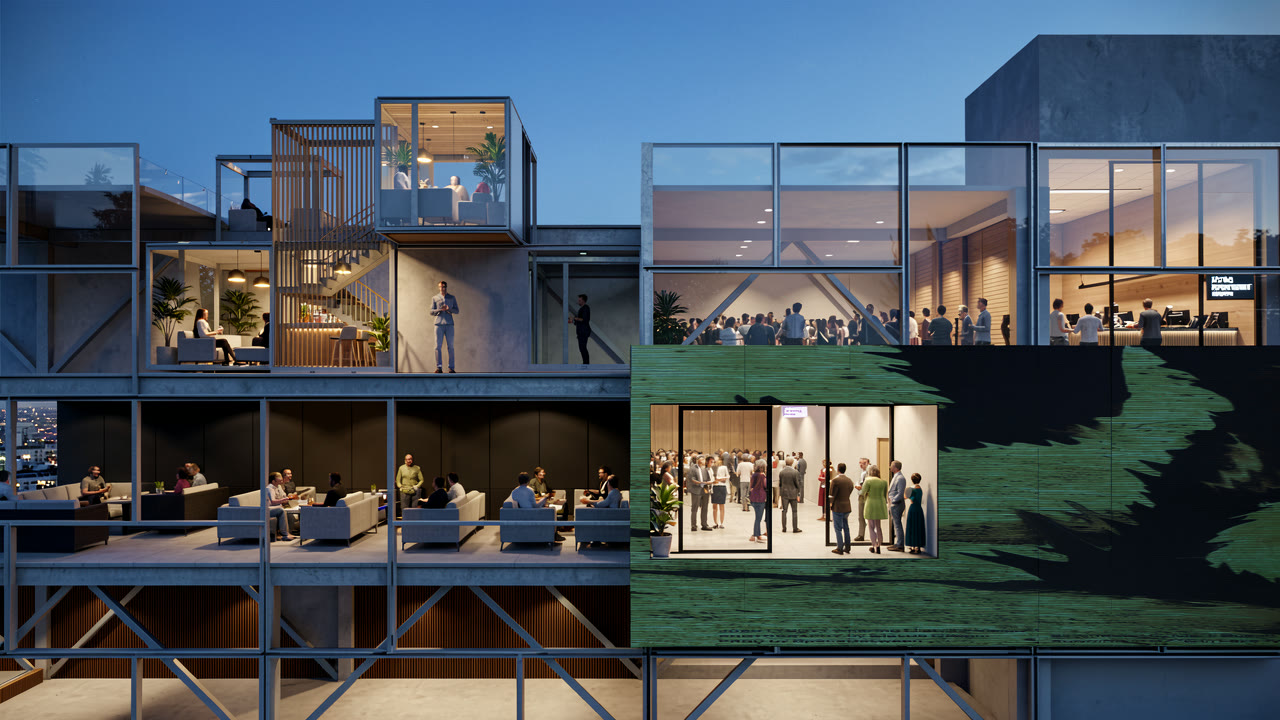 A NEXA block at dusk, offices, lounges and an event floor occupied at once behind a media wall