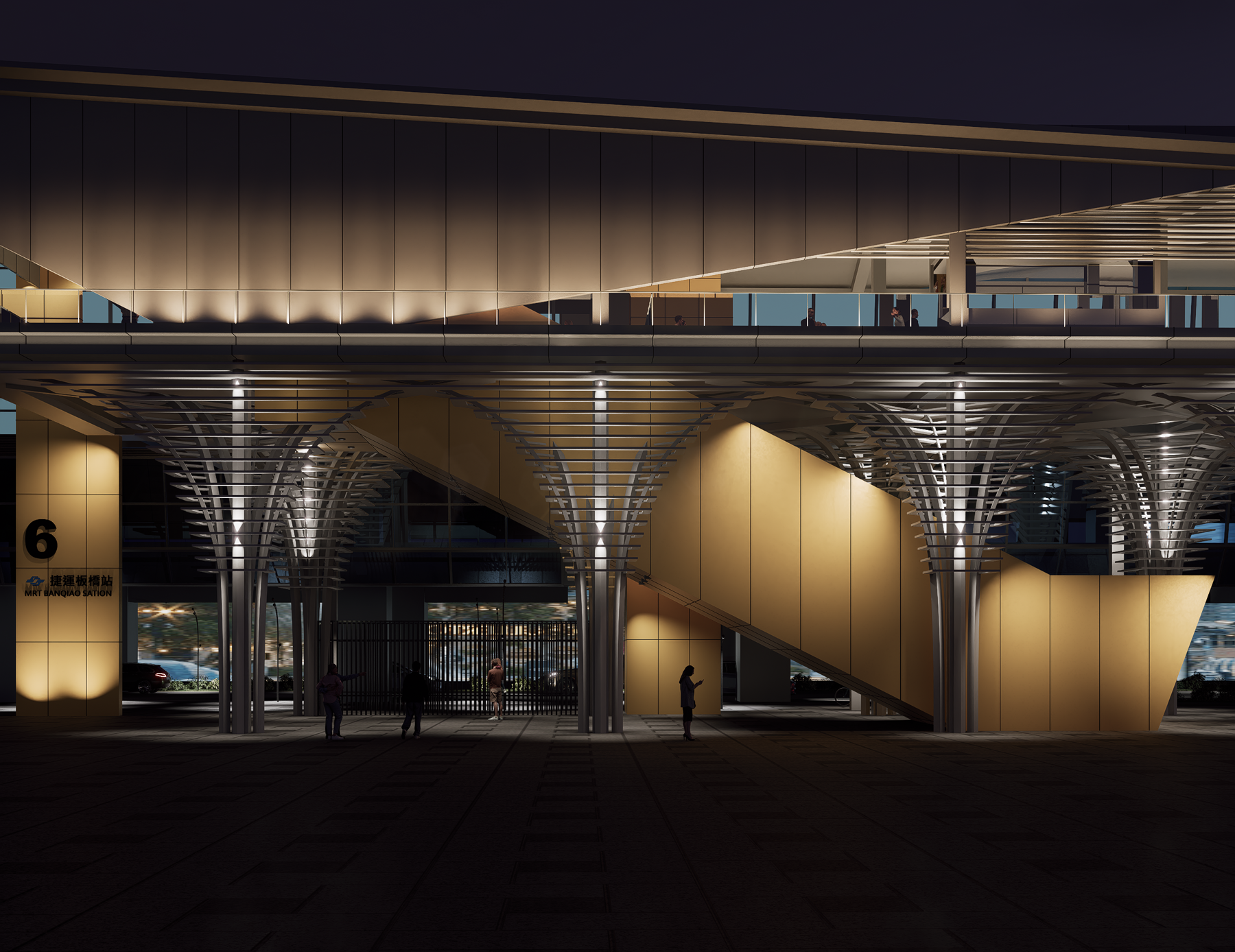 Night view — the loop-line colour lights the covered circulation