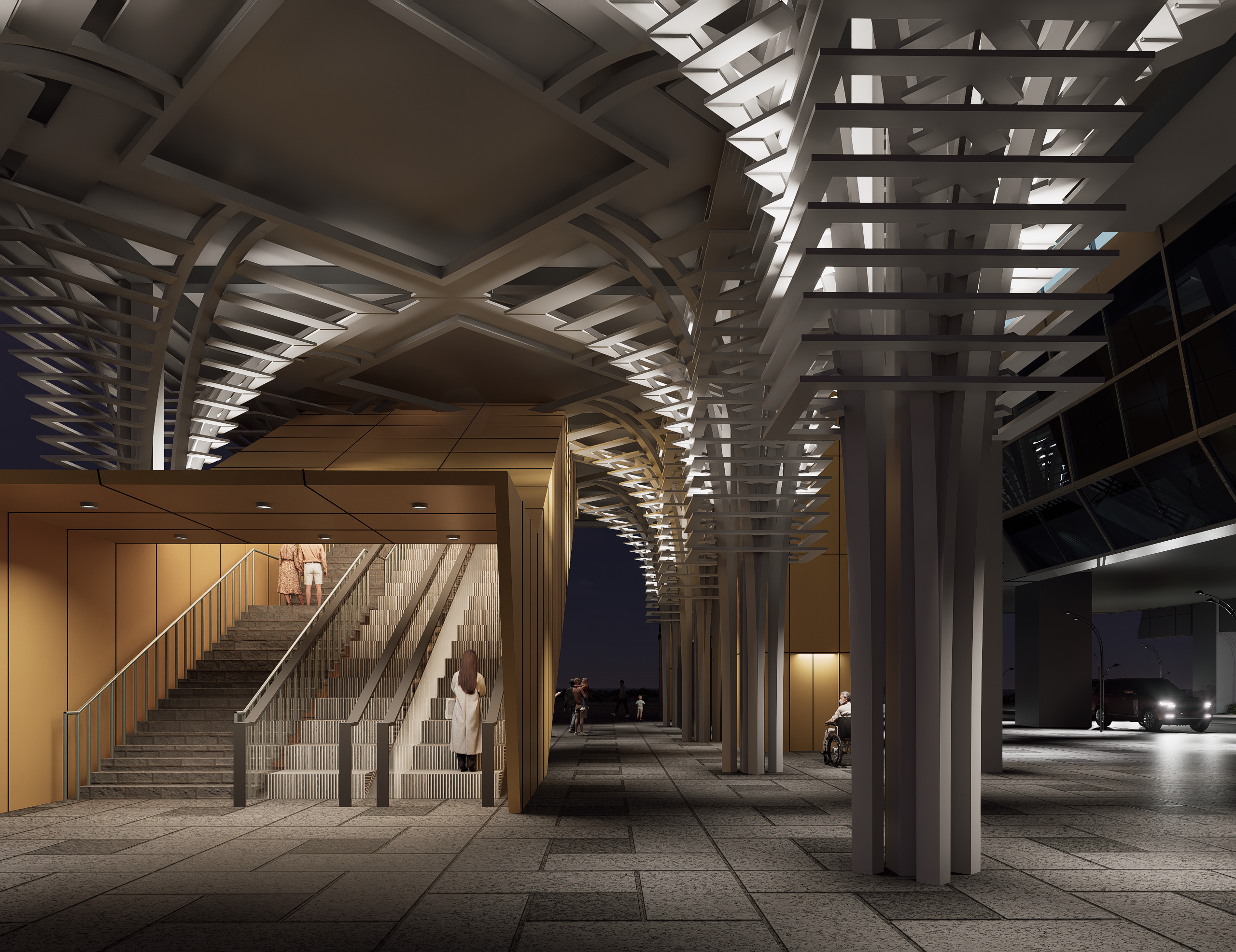 Night view beneath the lit canopy, stairs descending to the concourse